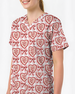 Jesus Loves You Heart Bow Nursing Scrub Top