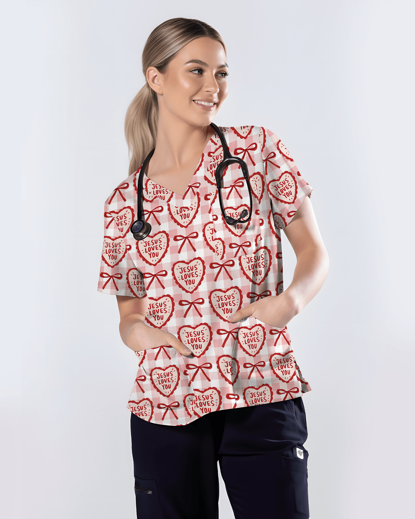 Jesus Loves You Heart Bow Nursing Scrub Top - Scrubloop