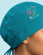 Personalized Birth Month Flower And Name Nurse Stethoscope Heart Premium Satin-Lined Scrub Cap - Scrubloop