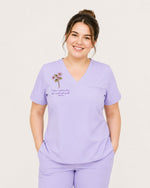 Personalized Birth Month Flower Nurse God Is Within Her She Will Not Fall Top - Scrubloop