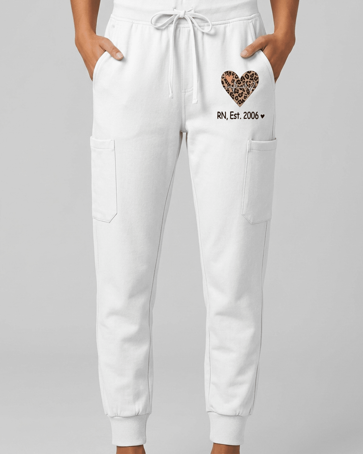 Personalized Job Title And Year Nurse Heart Leopard Pattern Women's One-Pocket V-neck Scrub Set - Scrubloop