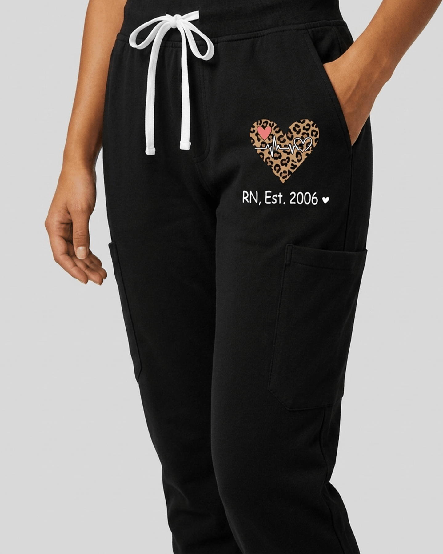 Personalized Job Title And Year Nurse Heart Leopard Pattern Women's One-Pocket V-neck Scrub Set - Scrubloop