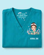 Personalized Name And Specialty The World Is A Better Place With You In It Hidden Message Rainbow Flower Decor Gift For Nurse Top - Scrubloop