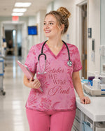 Personalized Name In October We Wear Pink Breast Cancer Awareness Flower Bow Pattern Gift For Nurse Top - Scrubloop