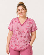 Personalized Name In October We Wear Pink Breast Cancer Awareness Flower Bow Pattern Gift For Nurse Top - Scrubloop