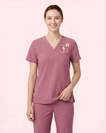 Personalized Nurse, Name And Birth Month Flower Women's One-Pocket V-neck Scrub Top - Scrubloop