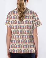Vibrant Tie Dye Floral Bunny Healthcare Scrub Top - Scrubloop